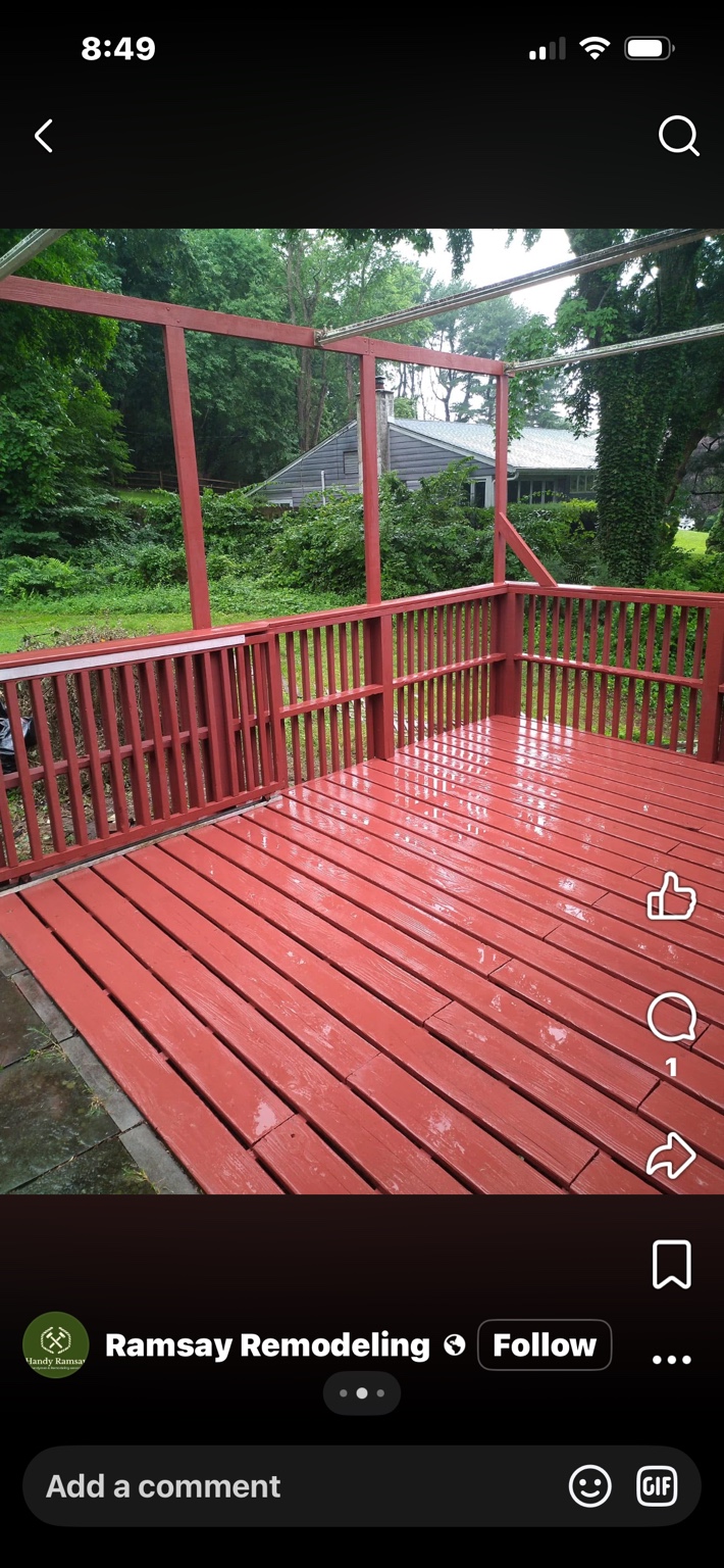 Restored deck after repairs and solid-color finish
