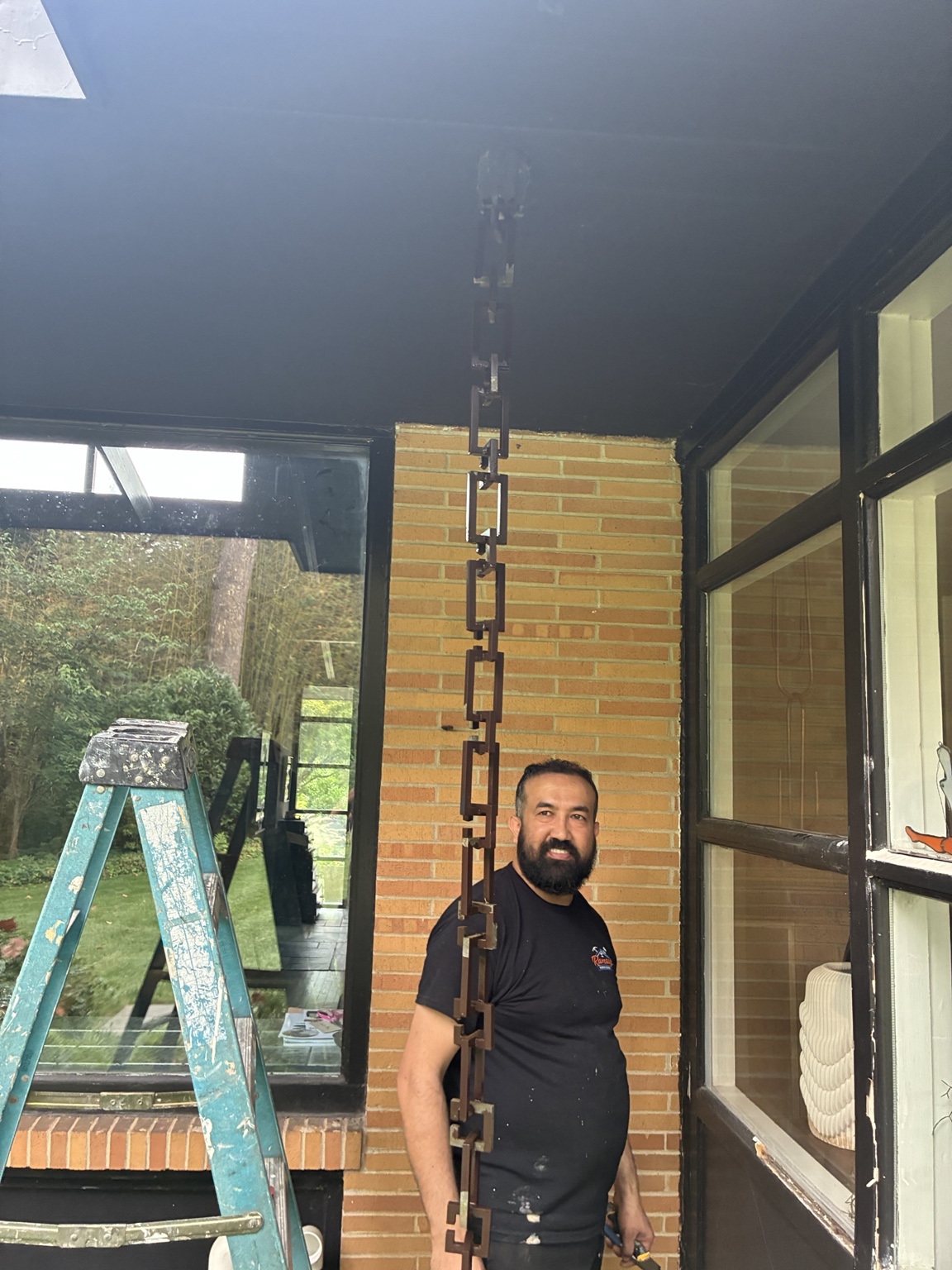 Mr. Umesh working with Ramsay Remodeling on an enclosed porch project